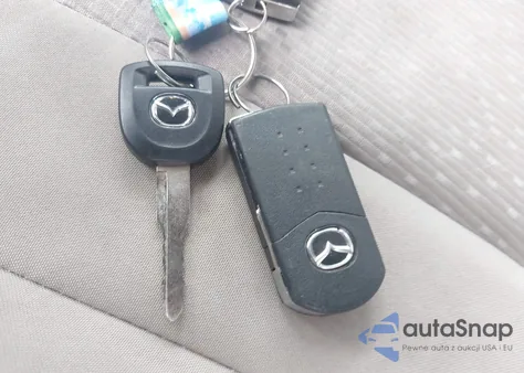 2012 Mazda Mazda5 Touring z USA, uszkodzony, nr VIN JM1CW2CL5C0133158